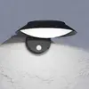 Solar-LED-Wandlampe Cerrisi, Breite 10,5 cm, schwarz, Sensor