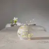 LED-Kugellampe Merry X-Mas Ø 12 cm weiß Glas Batteriebetrieb