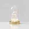 LED-Dekoleuchte Isla, messing/klar, Rentier, Höhe 20 cm