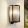 Lindby Außenwandlampe Peldar anthrazit/geriffelt 26cm Sensor