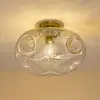 Lindby Deckenleuchte Lelia, amber, Glas, Ø 35 cm