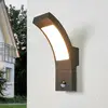 Lucande LED-Außenwandlampe Juvia, Sensor, 27 cm, grau, IP54