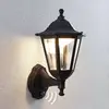 Lindby LED-Außenwandlampe Iavo, Sensor, schwarz, 38 cm, IP44