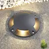 Lindby LED-Bodenstrahler Cormac, 4-flammig, Ø 21 cm, IP67