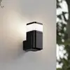 Lindby Außenwandlampe Teyon, mit Steckdose, schwarz, IP44 G9