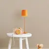 LED-Akku-Tischlampe Kaami, dimmbar orange matt