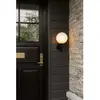 Nuura Außen-Wandlampe Miira, Ø 20 cm, schwarz/opal