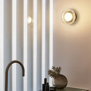 MARSET LED-Außenwandlampe Roc, Ø 14 cm, schwarz/transluzent