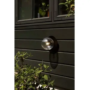Nuura Außen-Wandleuchte Liila, Ø 16 cm, schwarz/klar