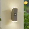Bild von Lindby LED-Wandleuchte Sally, 22 cm, grau, IP54, Sensor