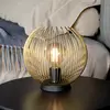 Bild von Tischlampe Venezuela, Schirm aus goldenen Stäben