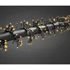 Bild von Konstsmide Micro LED Büschellichterkette Cluster, mit Multifunktion, frei wählbarem Timer und Dimmer, reagiert auf Musik, App-gesteuert (Android & IOS), 960 bernsteinfarbene Dioden, 36V_Außentrafo, schwarzes Kabel - 6563-870